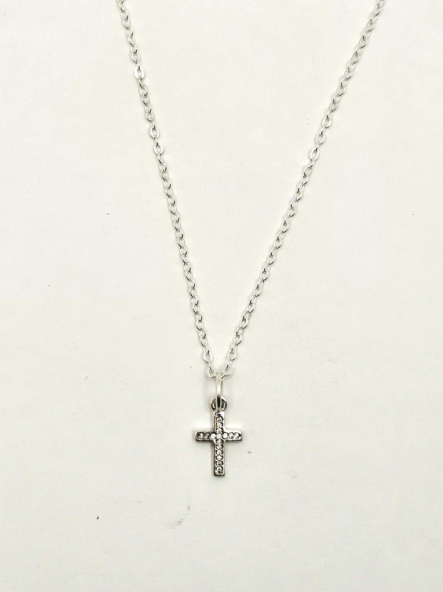 Sterling silver channel Cubic Zirconia cross pendant